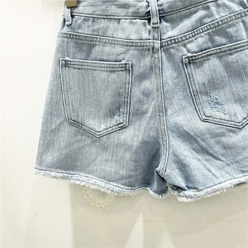 กางเกงยีนส์ขาสั้นขาดเซอร์ๆ ทรง - Distressed Jean Rip บทวิจารณ์และราคา